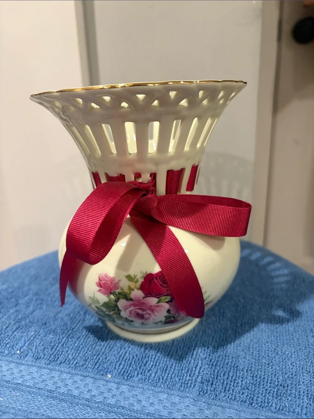 Cream Porcelain Floral Bud Vase with Pink Ribbon Accent